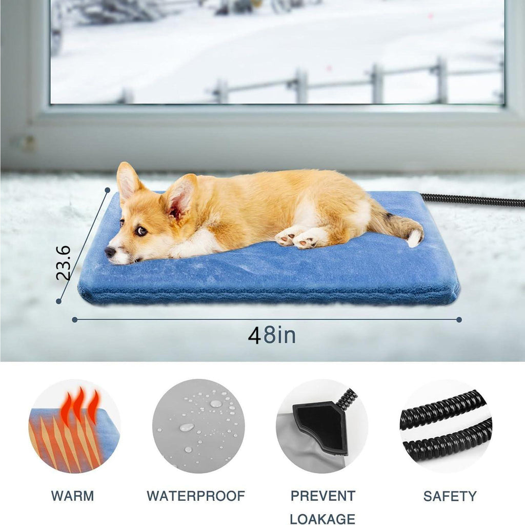 Corgi lying on a blue heated pad by a snowy window, approx. 122 x 60cm