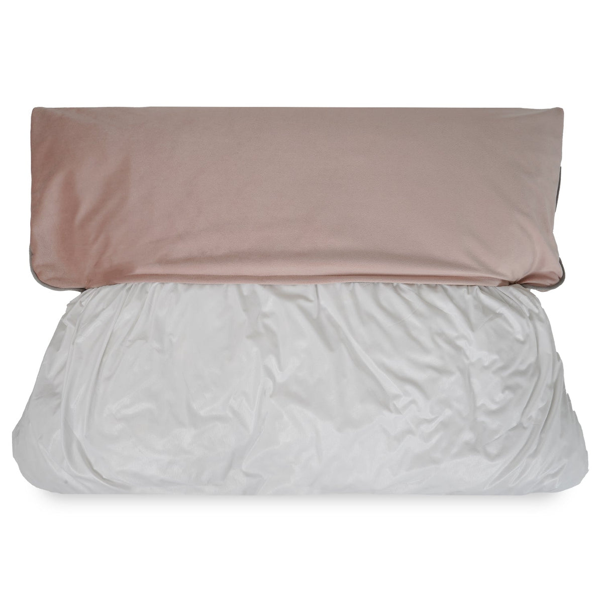 Pink washable cover being removed from the white inner of the Ralph & Co crate mattress