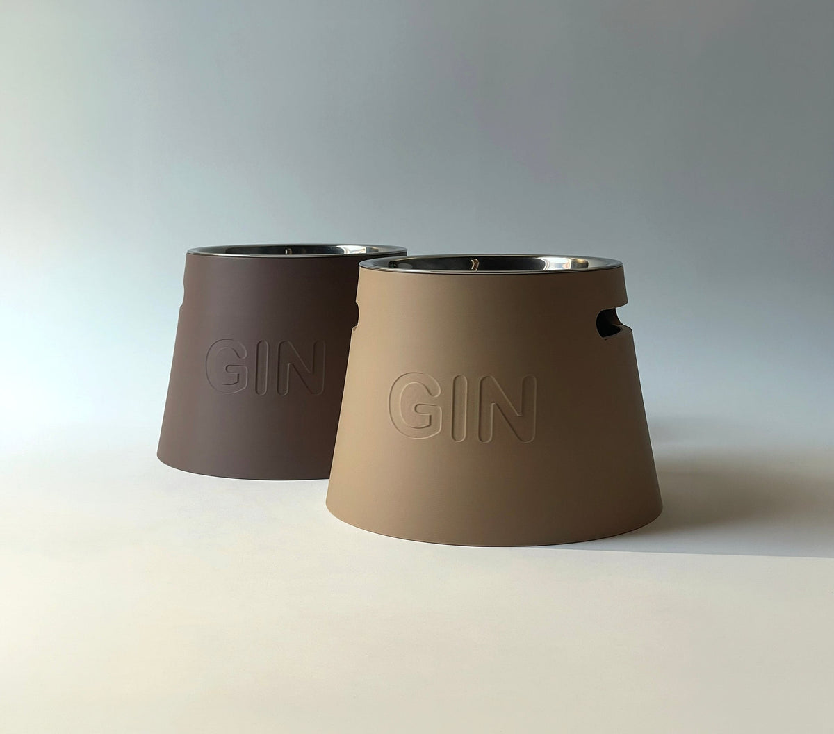 Classic tapered raised stands in brown and tan with embossed names and steel bowls