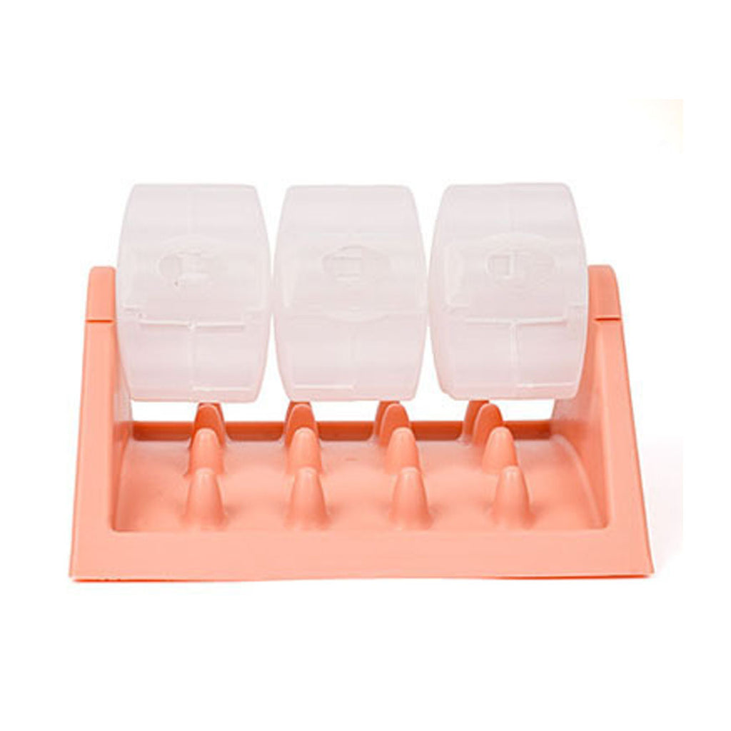 Pink slow feeder base with three clear drums, front view