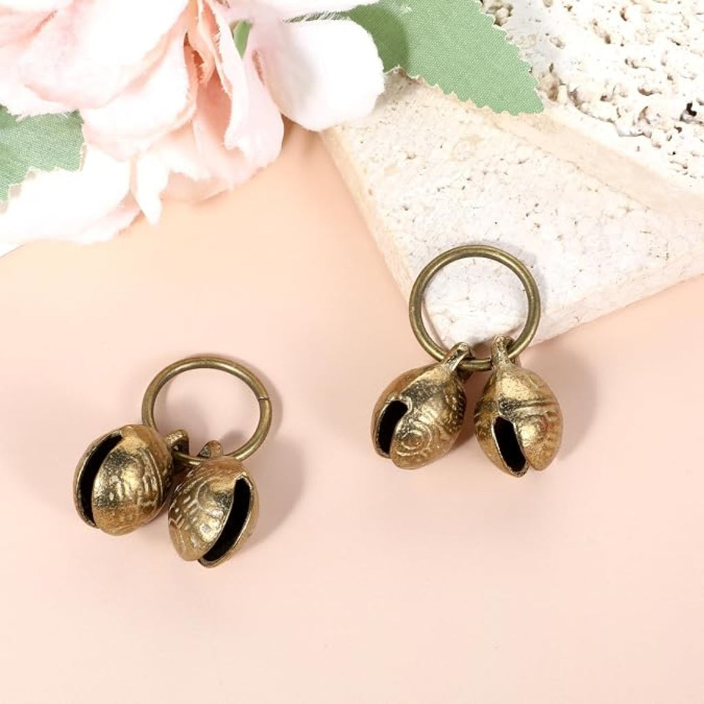 Two pairs of gold brass collar bells on split rings