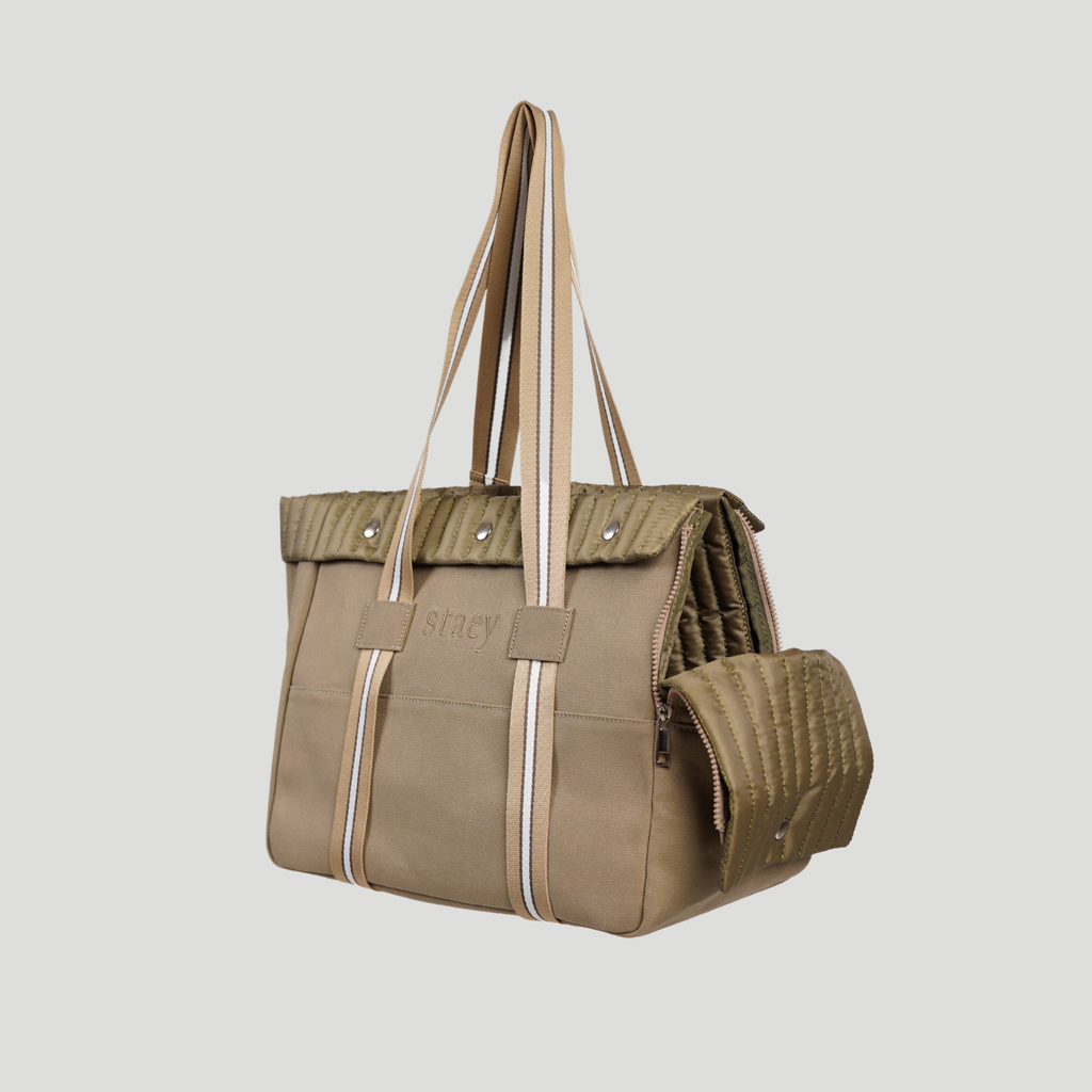 Taupe dog carrier bag with tall striped handles, three-quarter view