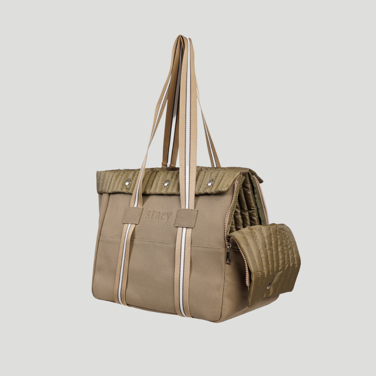 Taupe dog carrier bag with tall striped handles, three-quarter view