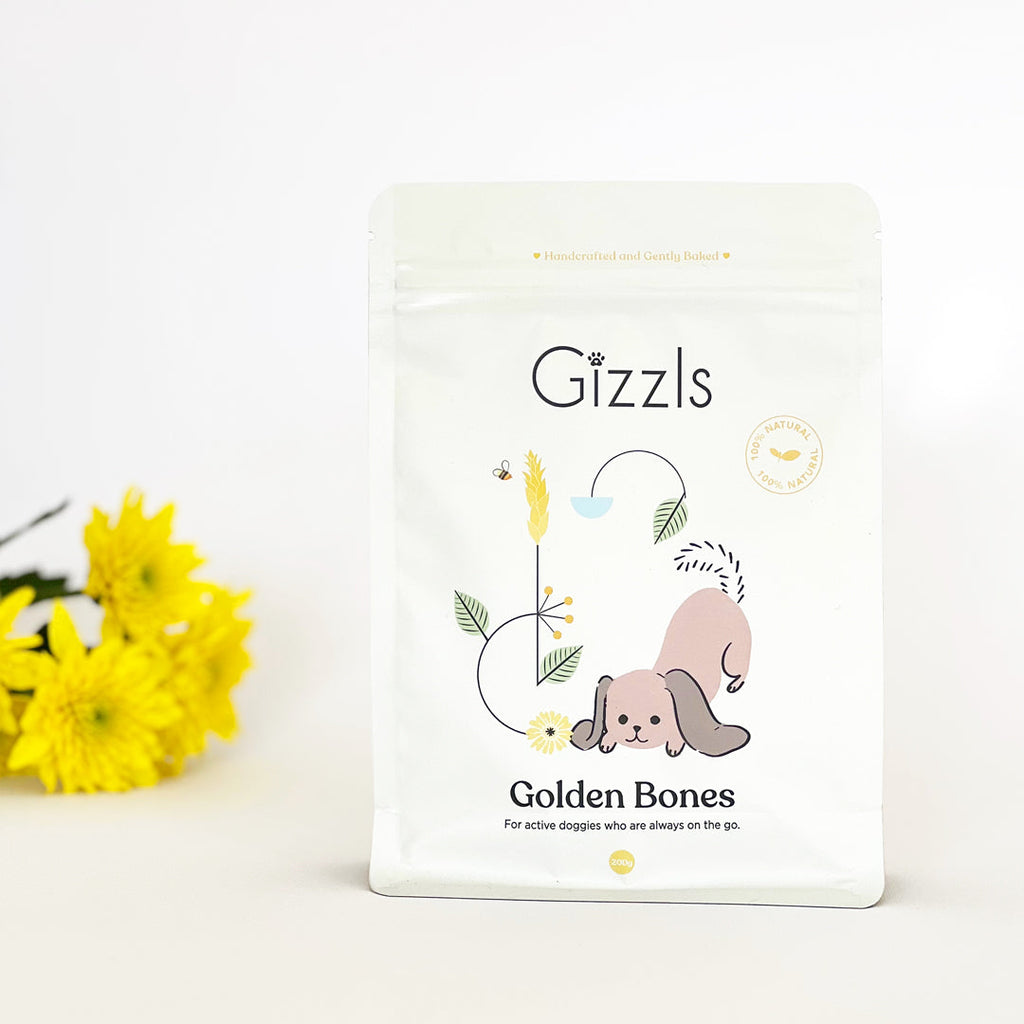 Gizzls Golden Bones 200g pouch with yellow chrysanthemums