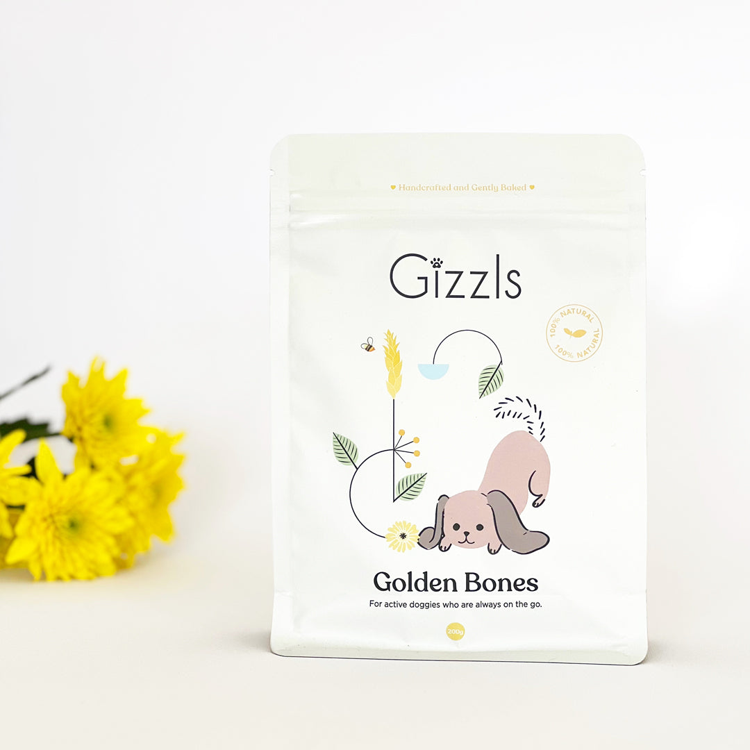 Gizzls Golden Bones 200g pouch with yellow chrysanthemums