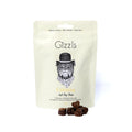 Gizzls Calming Soft Dog Treats cream pouch with bulldog in bowler hat and dark soft cubes