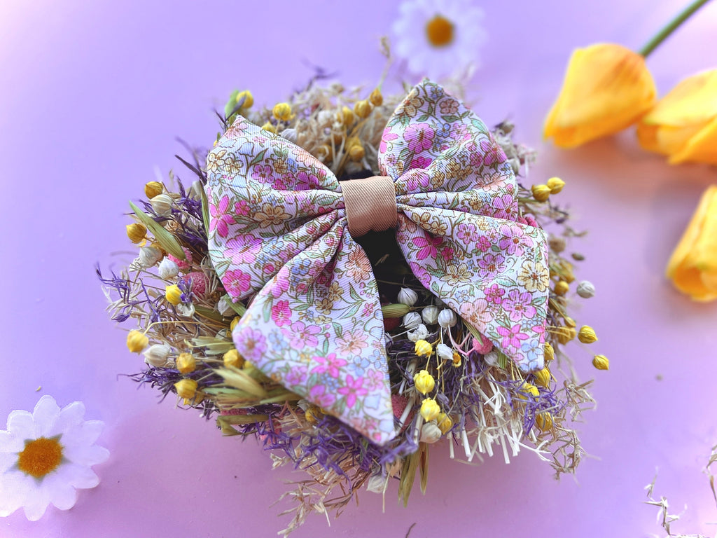 Pastel floral dog bow tie on a dried flower wreath
