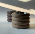 Rings Raised Dog Bowl Stand 12cm in taupe and dark brown with steel bowls in soft sunlight