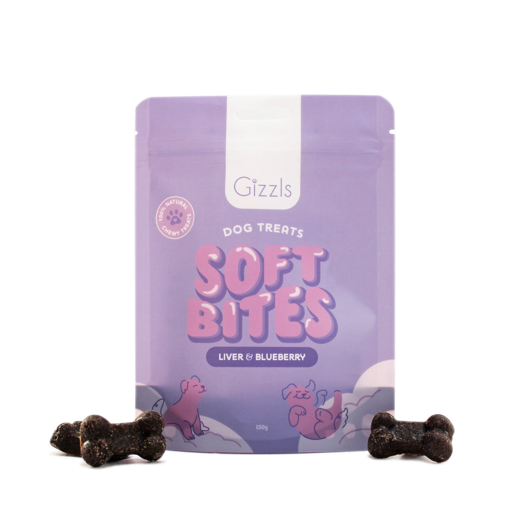 Purple Soft Bites Ostrich Liver & Blueberry pouch with two dark bone-shaped treats