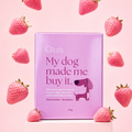 Pink My Dog Made Me Buy It Peanut Butter & Strawberry treat box surrounded by strawberries