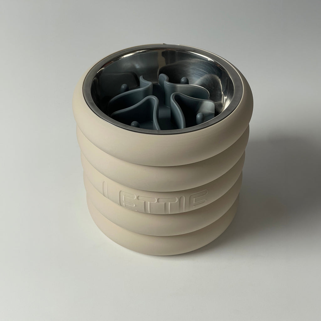 Cream rings raised stand with steel bowl and grey slow feeder insert fitted