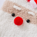 Close-up of the Santa jumper's red pom-pom nose and soft sherpa beard