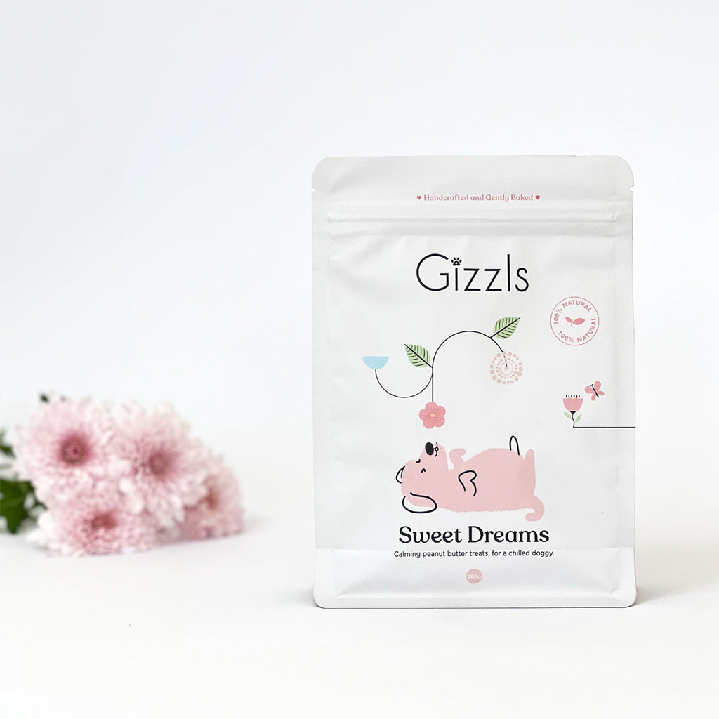 Sweet Dreams Big Dog Treats 200g pouch with two biscuits and pink chrysanthemums