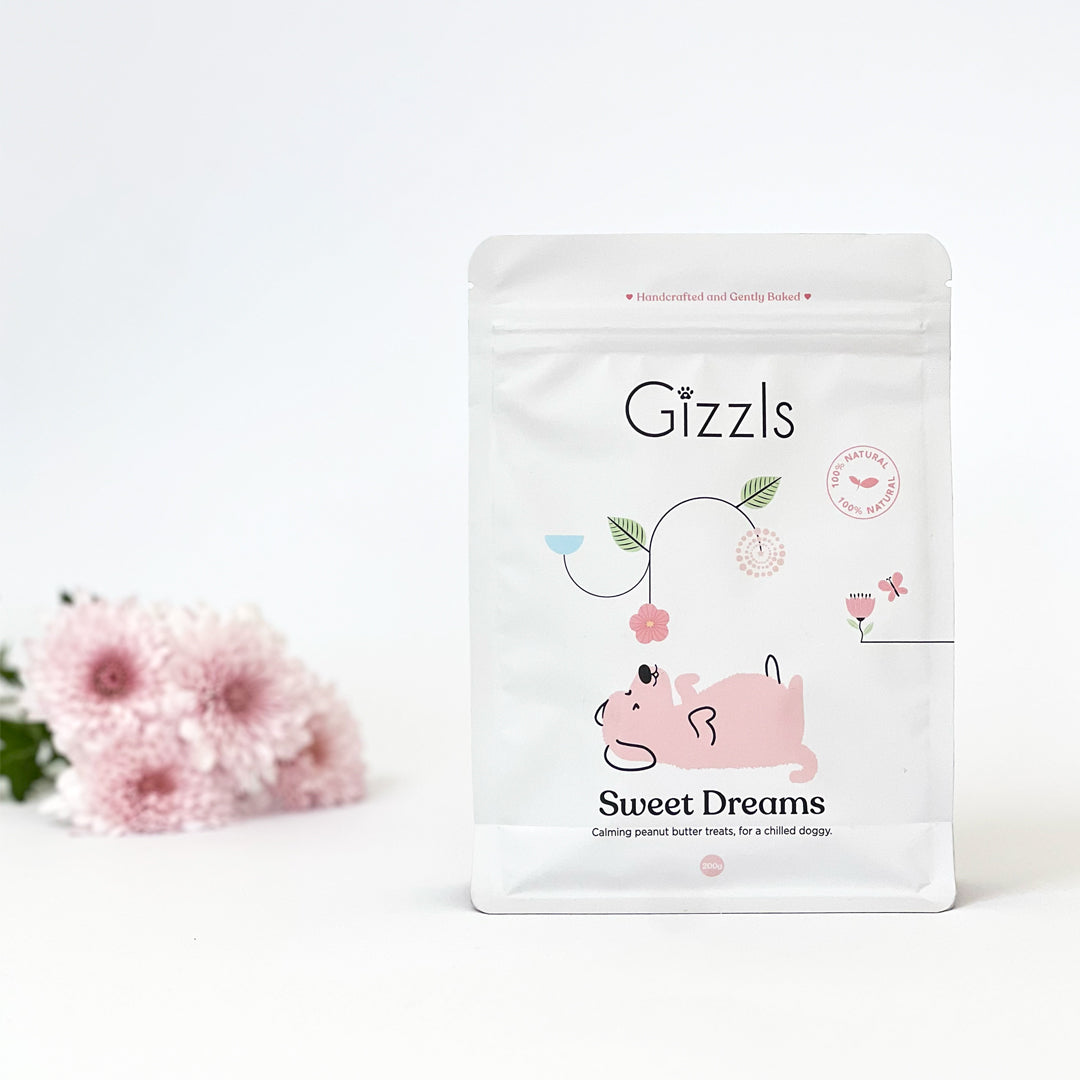 Sweet Dreams Big Dog Treats 200g pouch with two biscuits and pink chrysanthemums
