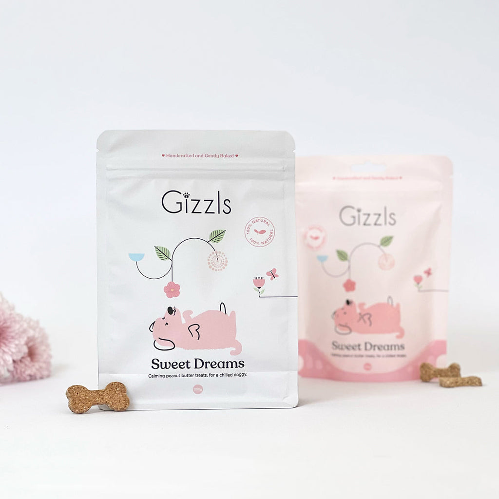 White 200g and pink 100g Sweet Dreams pouches with bone-shaped biscuits
