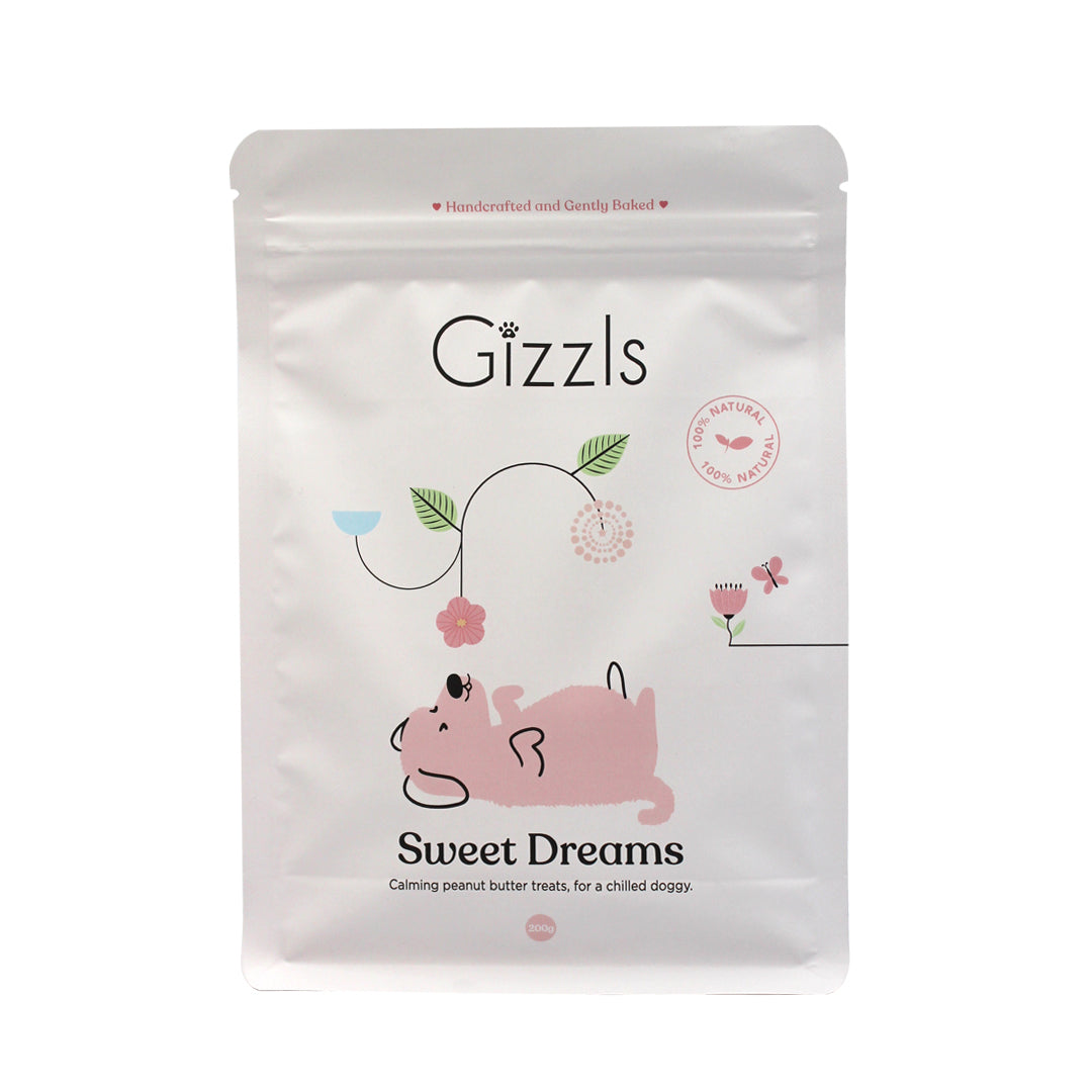 Front of the white Gizzls Sweet Dreams Big Dog Treats 200g pouch with pink illustrated pup
