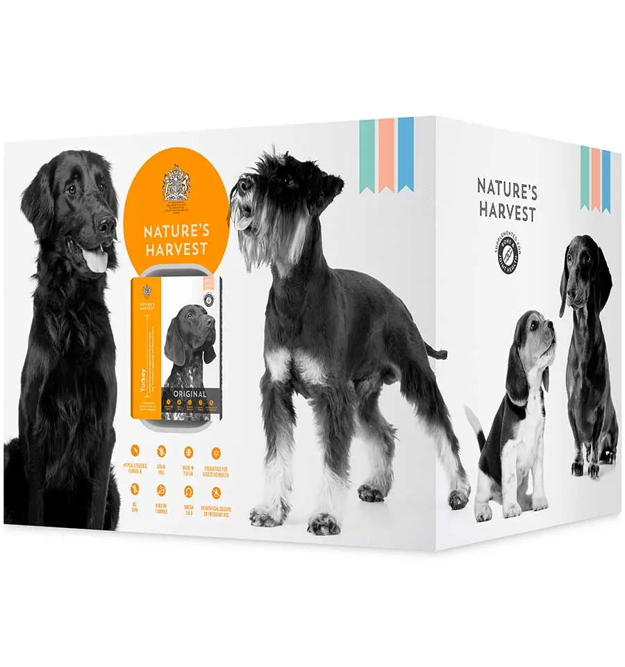 Nature's Harvest wet dog food outer box printed with retriever, schnauzer and spaniel illustrations