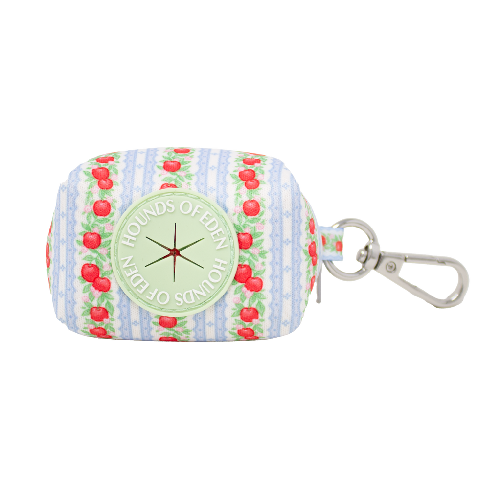 Eden's Orchard poop bag holder with red apples on blue stripes and silver clip
