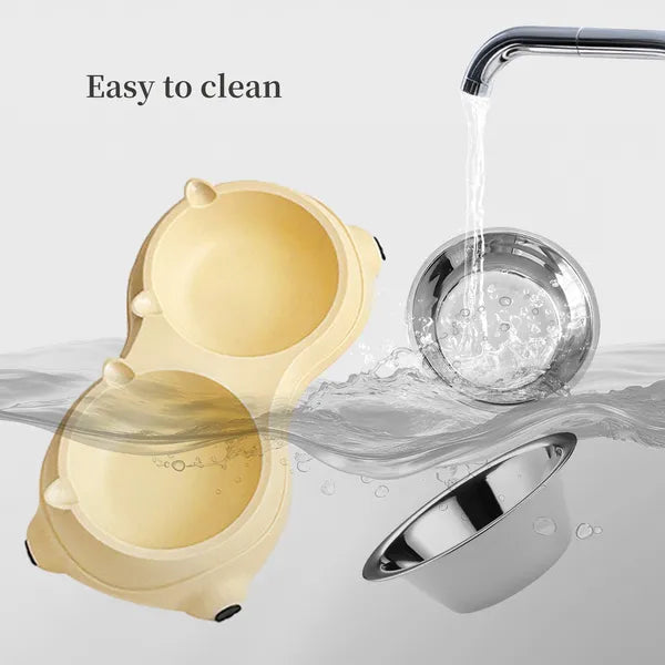 Stainless steel bowls lifted out of the cream stand and rinsed under a tap