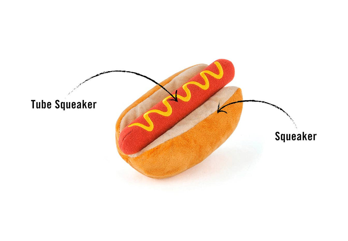 Hot dog toy diagram showing tube squeaker in the sausage and squeaker in the bun
