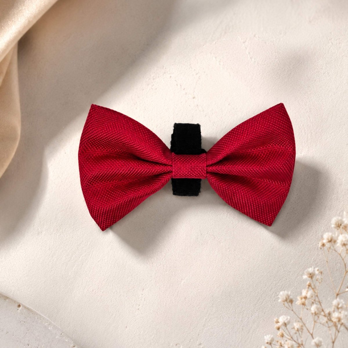 Berry Red Dog Bow Tie on a cream background showing the black hook-and-loop strap