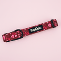 Burgundy Bloom Dog Collar with pink rose print and black D-ring on pink background