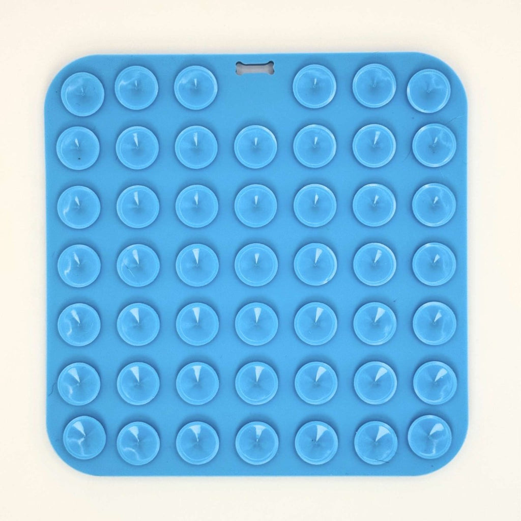 Back of the Blue Silicone Dog Lick Mat showing rows of suction cups