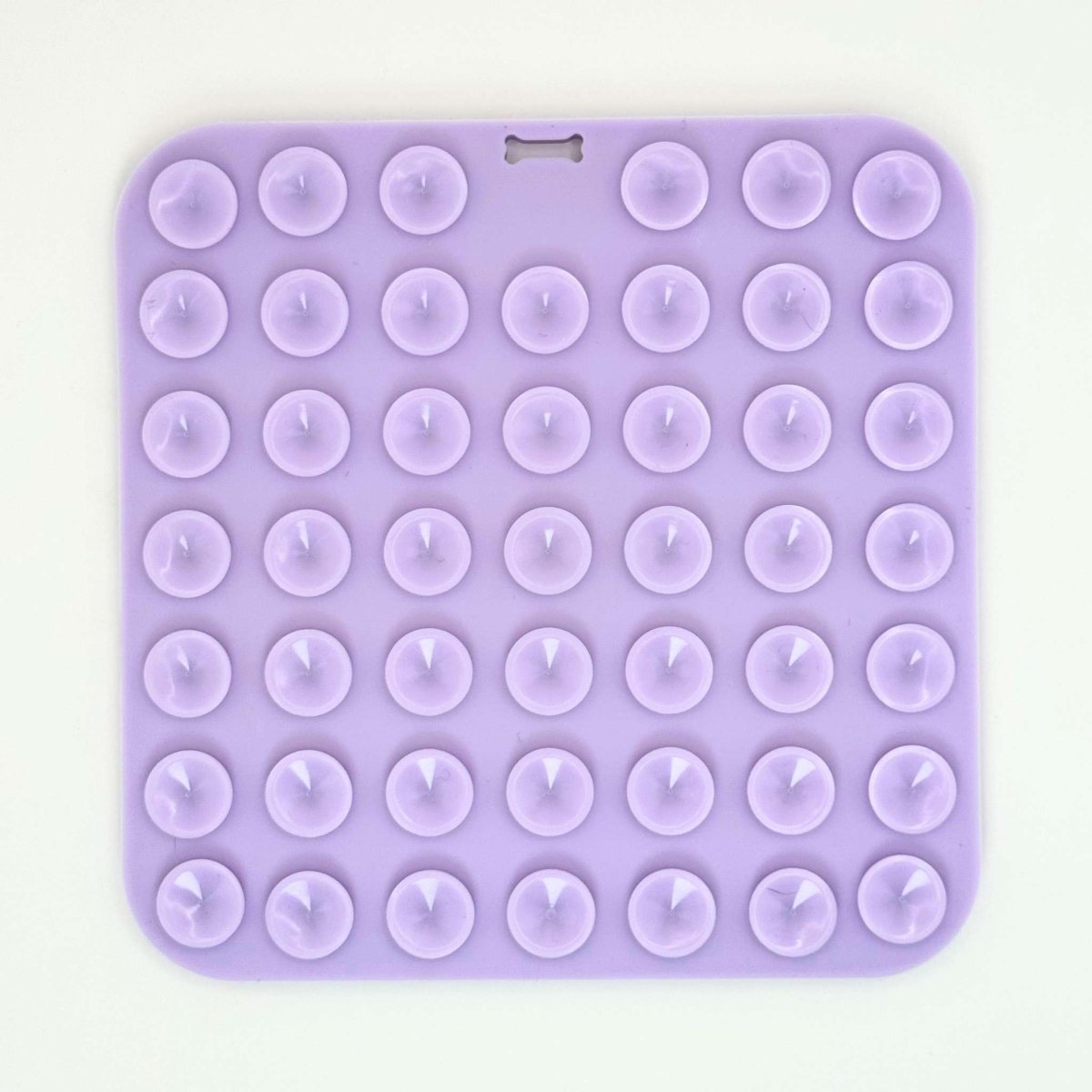 Back of the Lilac Silicone Dog Lick Mat showing rows of suction cups