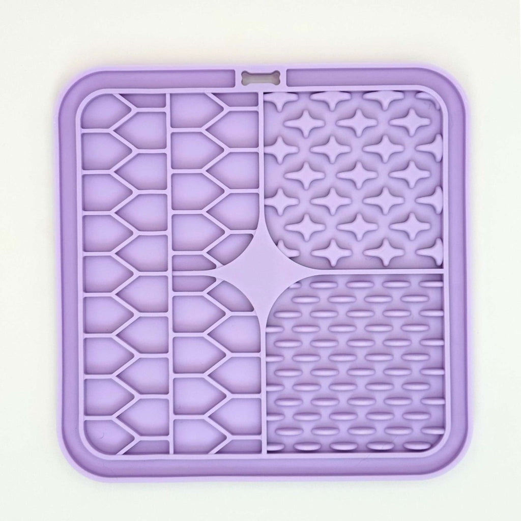 Front of the Lilac Silicone Dog Lick Mat with stars, ridges and grooves