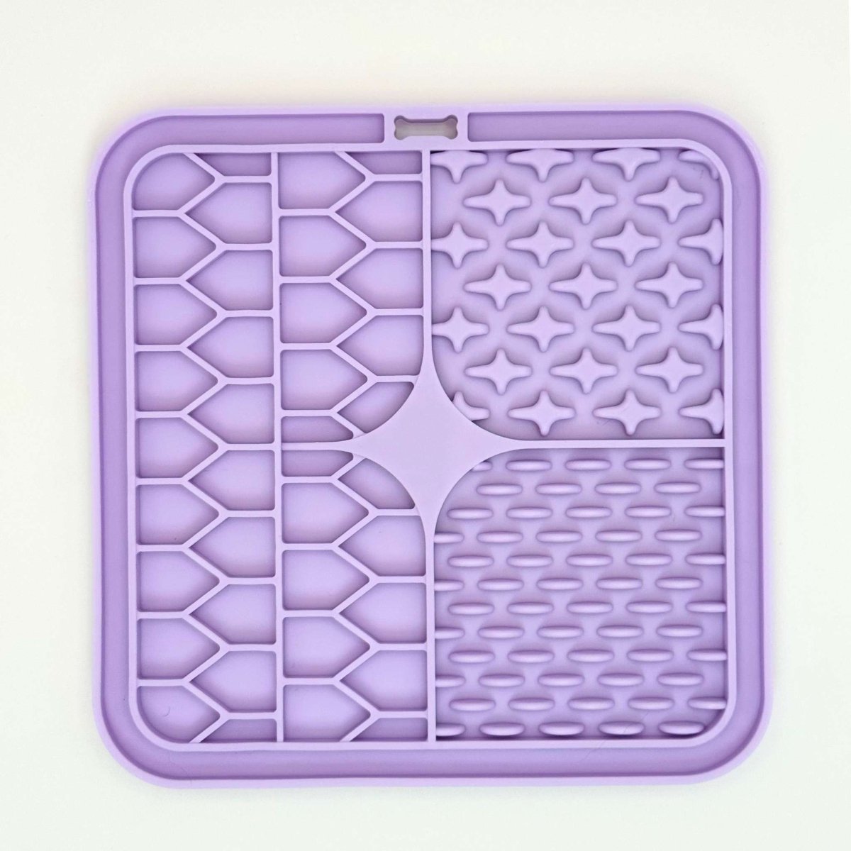 Front of the Lilac Silicone Dog Lick Mat with stars, ridges and grooves