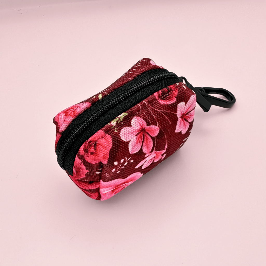 Side of the Burgundy Bloom Poo Bag Holder showing zip pocket and pink floral print