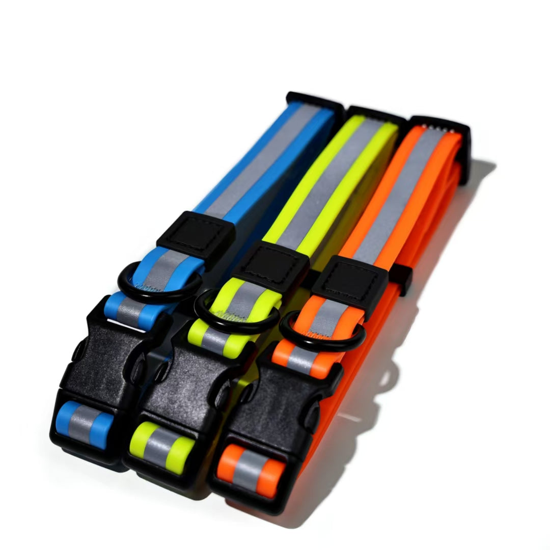Blue, yellow and orange reflective collars stacked together