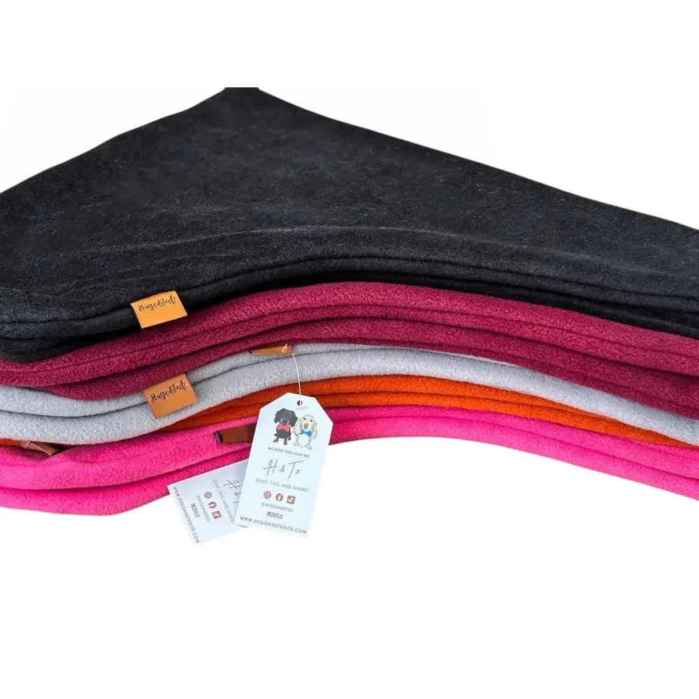 Stack of Plain Fleece Dog Slings in black, wine, silver, rust and cerise