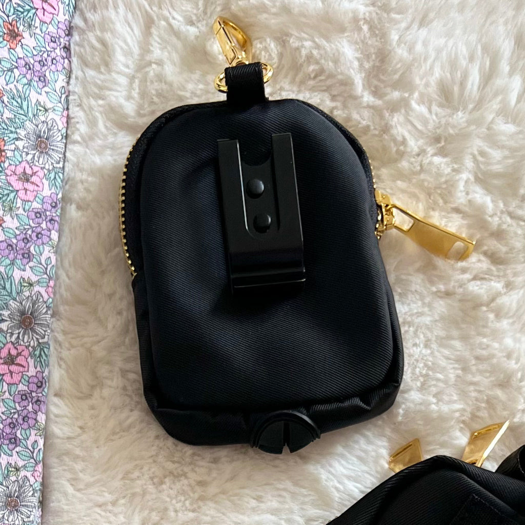 Back of black treat pouch showing the metal belt clip