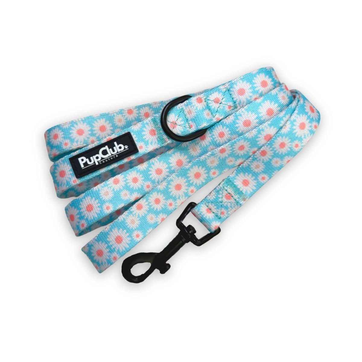 Pastel Daisy Dog Lead coiled, pink daisies on blue with padded handle and black clip