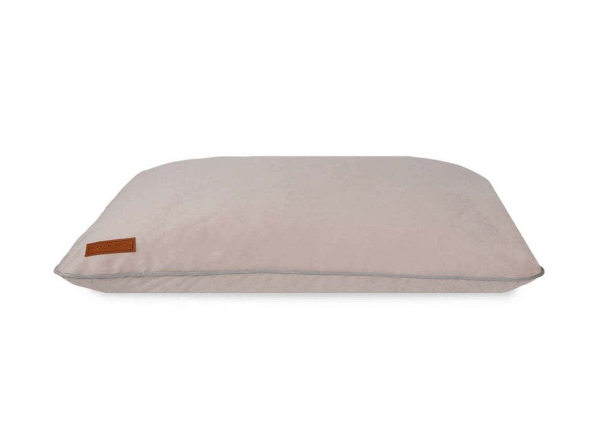 Ralph & Co memory foam dog crate mattress in dusty pink with grey piping and leather badge