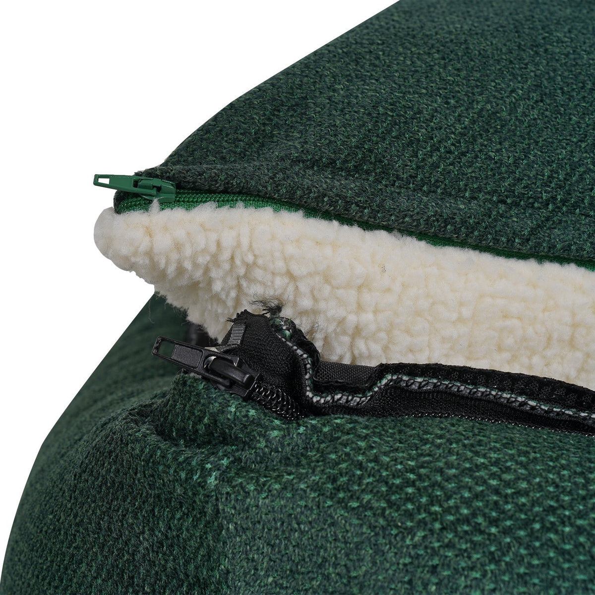 Close-up of the zip and cream sherpa lining on the Richmond green dog bed