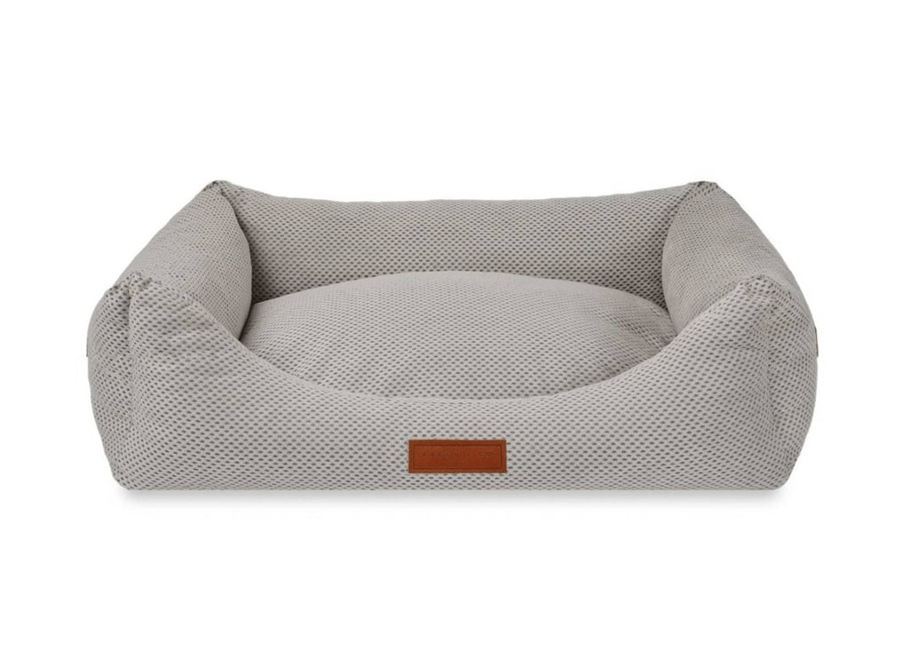 Highclere grey knitted memory foam bolster dog bed with leather badge