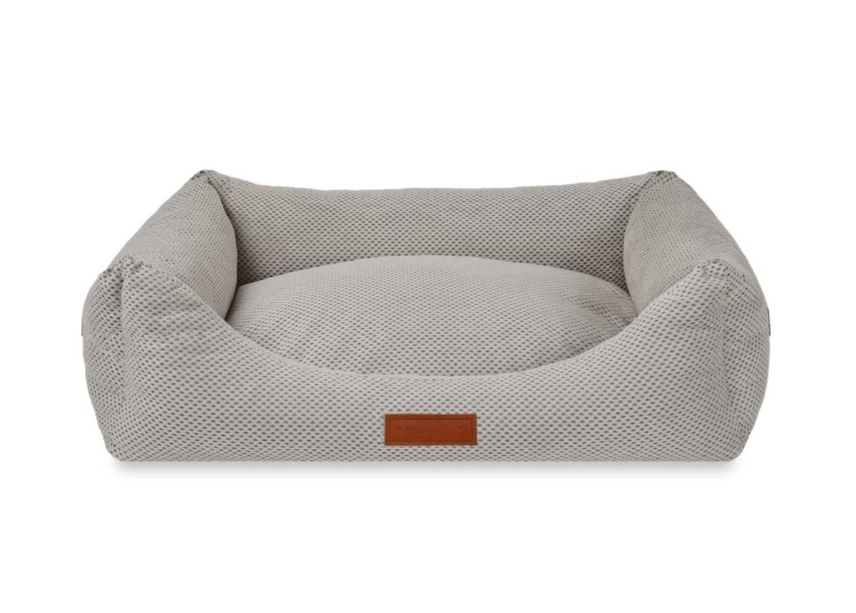 Highclere grey knitted memory foam bolster dog bed with leather badge