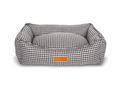 Kensington black and white houndstooth bolster dog bed with tan leather badge