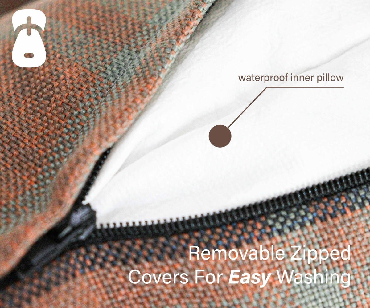 Zip close-up on the Marlow tartan bed showing the waterproof inner pillow
