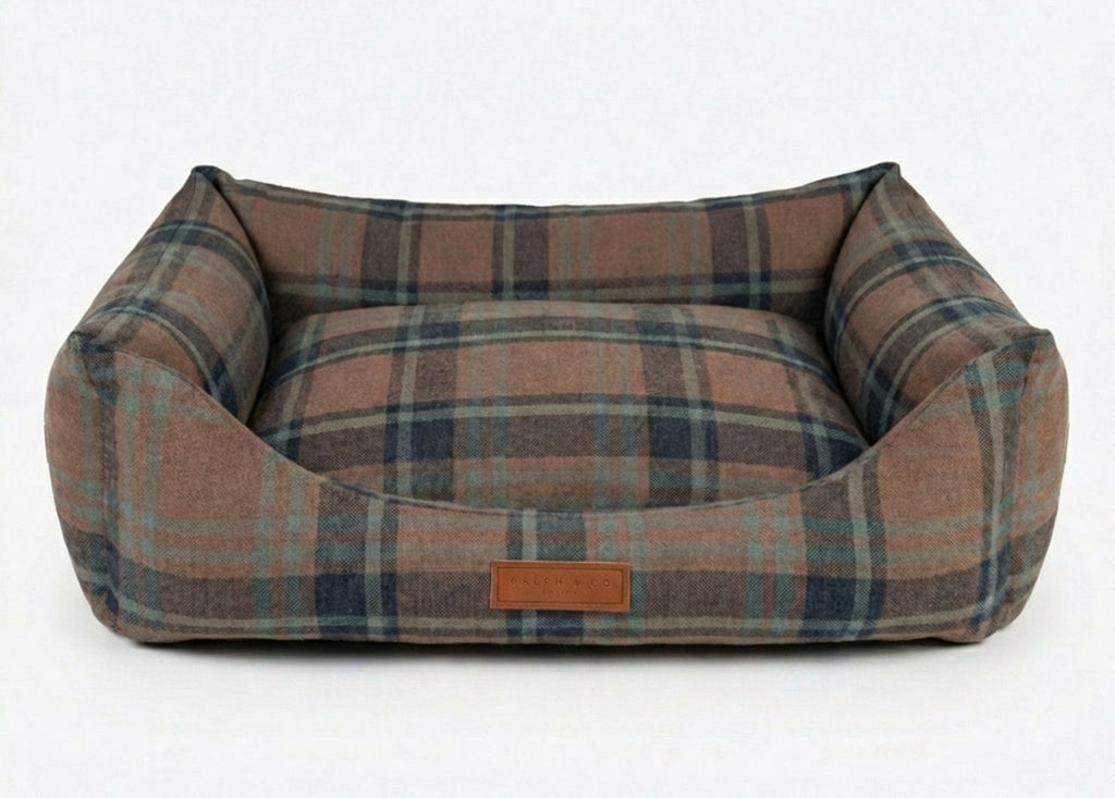 Marlow brown and blue tartan bolster dog bed with leather Ralph & Co badge