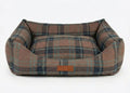 Marlow brown and blue tartan bolster dog bed with leather Ralph & Co badge