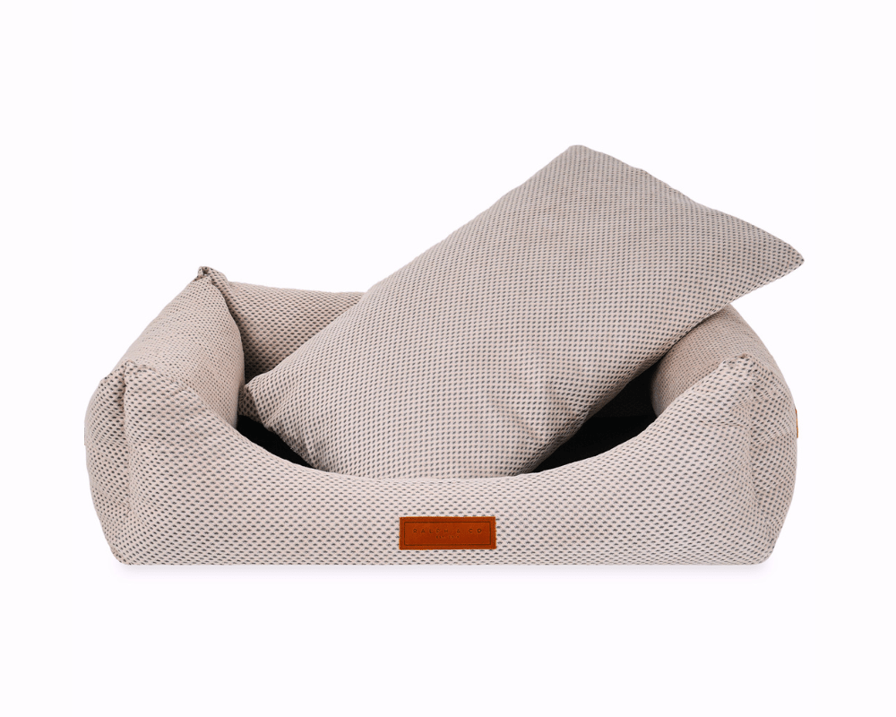 Chatsworth beige bed with its reversible memory foam cushion lifted