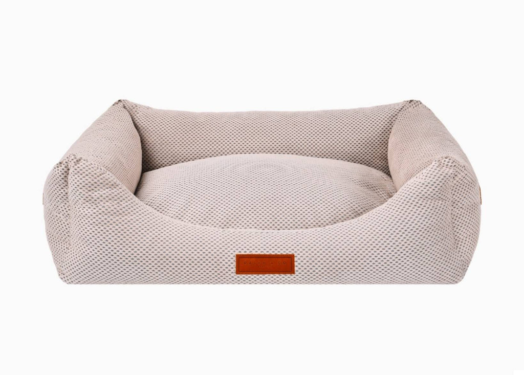Chatsworth beige knitted memory foam bolster dog bed with leather badge