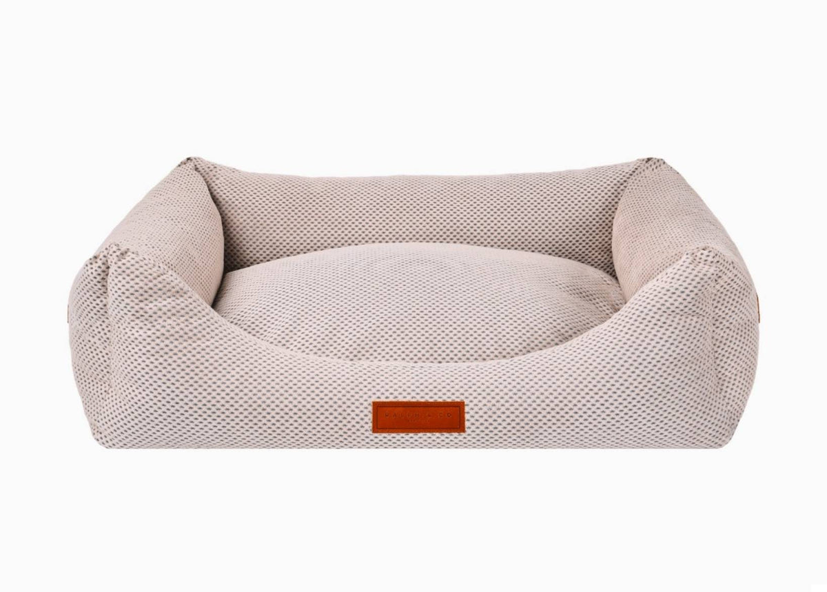 Chatsworth beige knitted memory foam bolster dog bed with leather badge