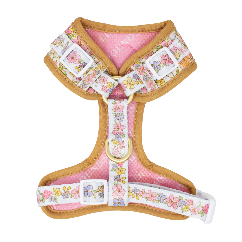 Inside view of the floral dog harness showing pink mesh lining and adjustable straps