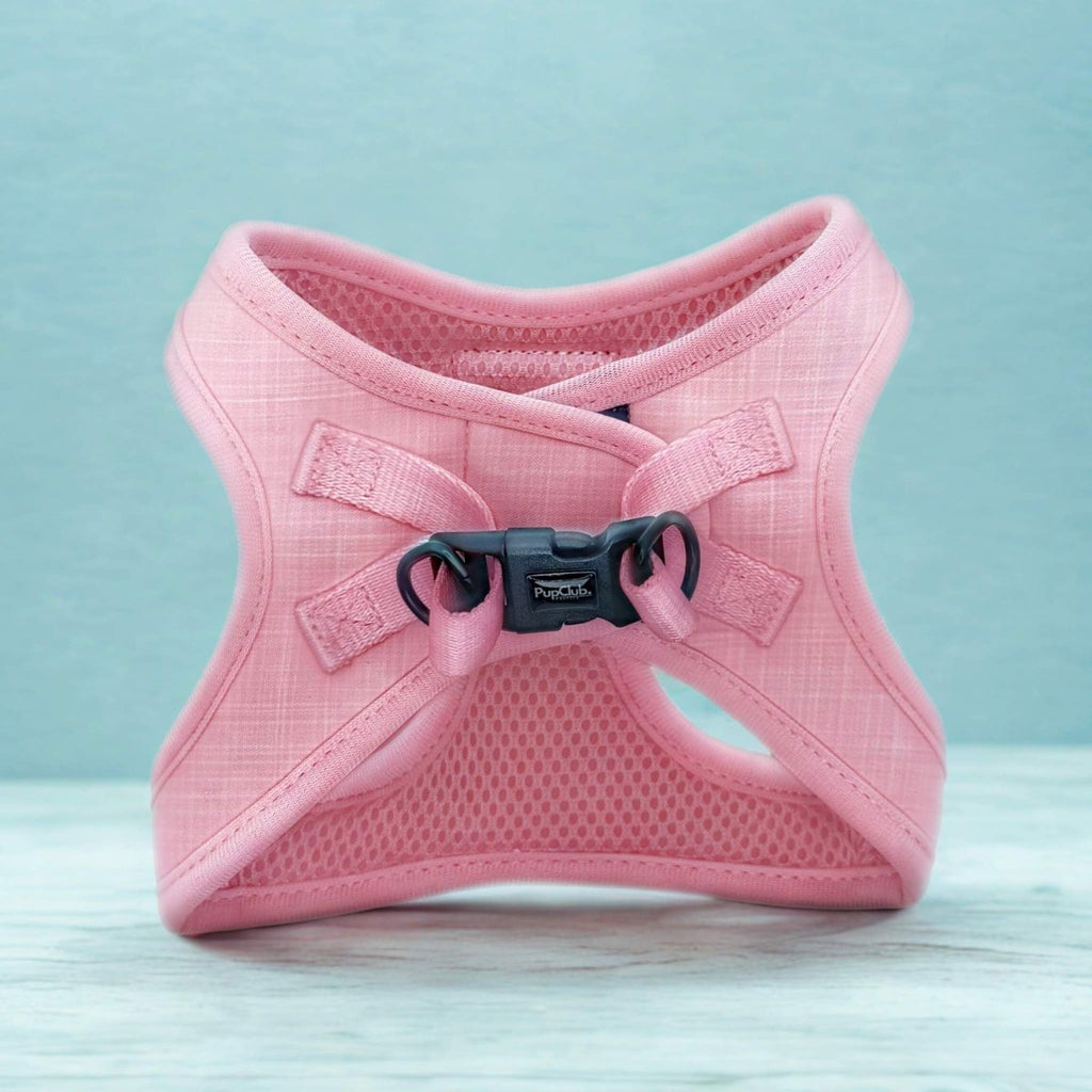 Back of the pink Puppy Step-In Harness showing velcro straps and clip buckle