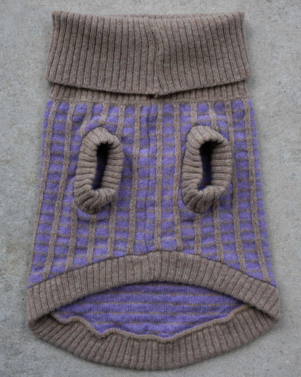 Underside of the purple merino dog jumper with taupe leg cuffs