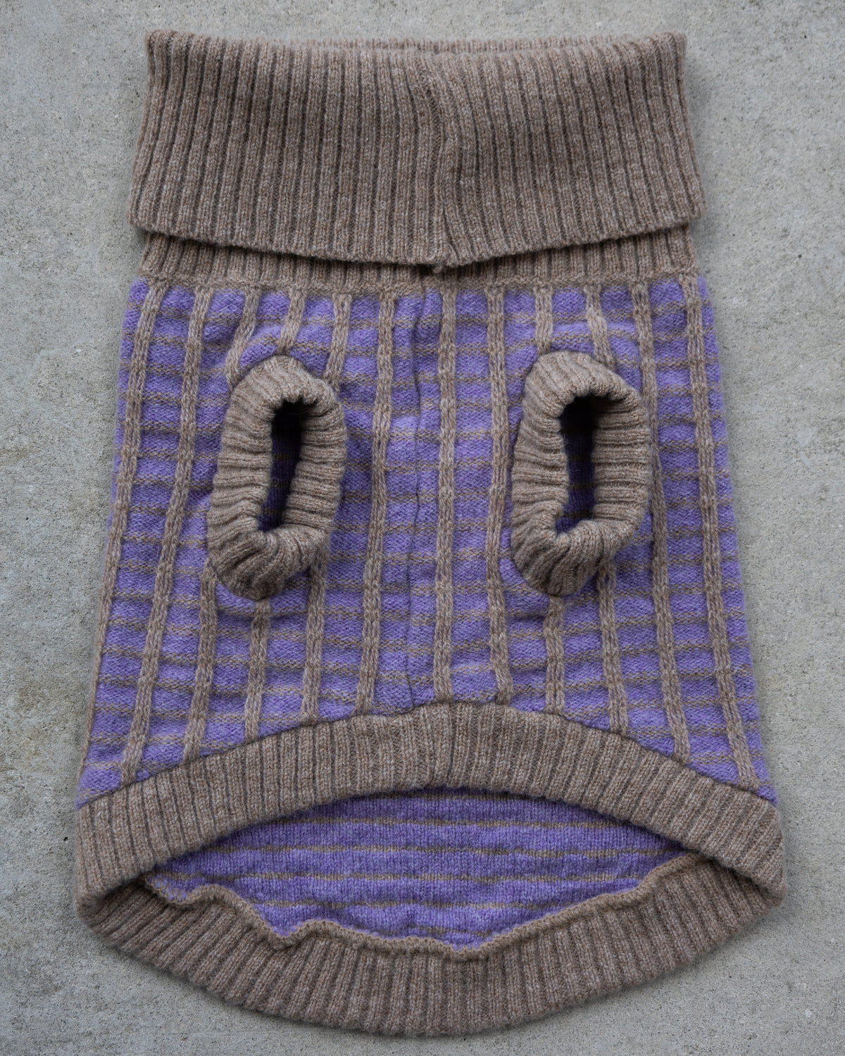 Underside of the purple merino dog jumper with taupe leg cuffs